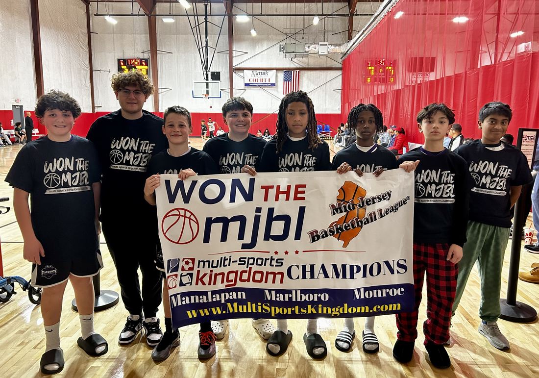 ECC team celebrating their MJBL championship win