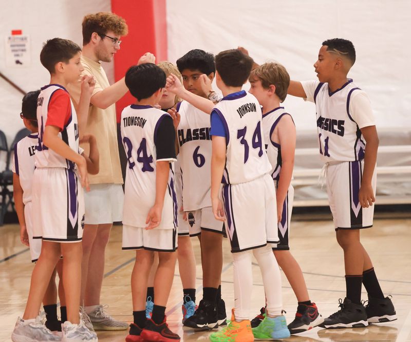 ECC team huddle with coach