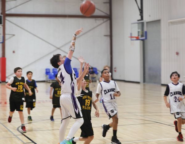 ECC basketball action