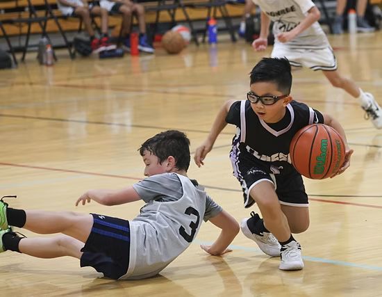 ECC basketball action