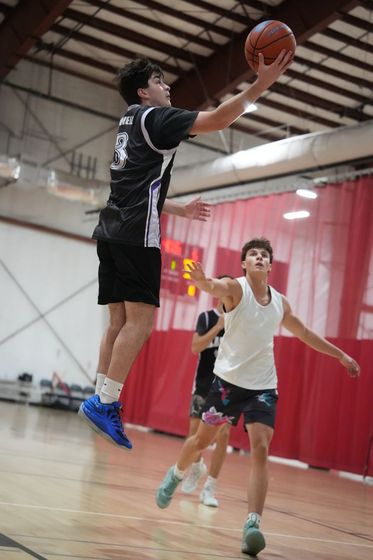 ECC basketball action