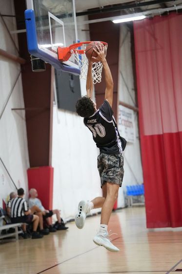 ECC basketball action