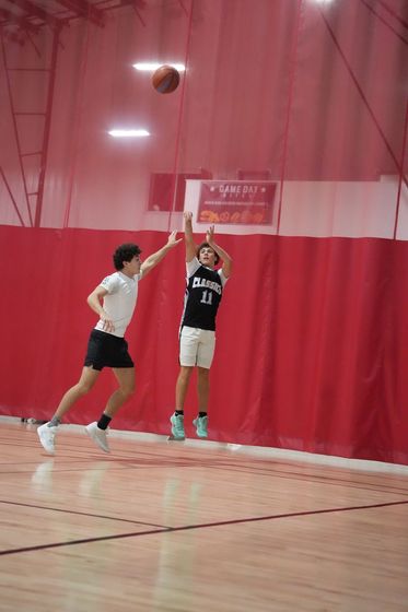ECC basketball action